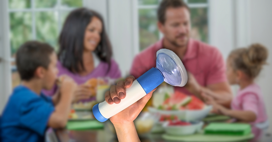 Family dining together with an anti-choking device ready for choking rescue, ensuring safety during meals.